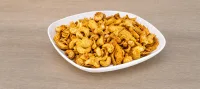 Křupavé kari kešu s kokosovými chipsy z trouby